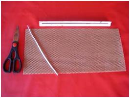 placa de cera de abelha, tesoura, regra e pavio